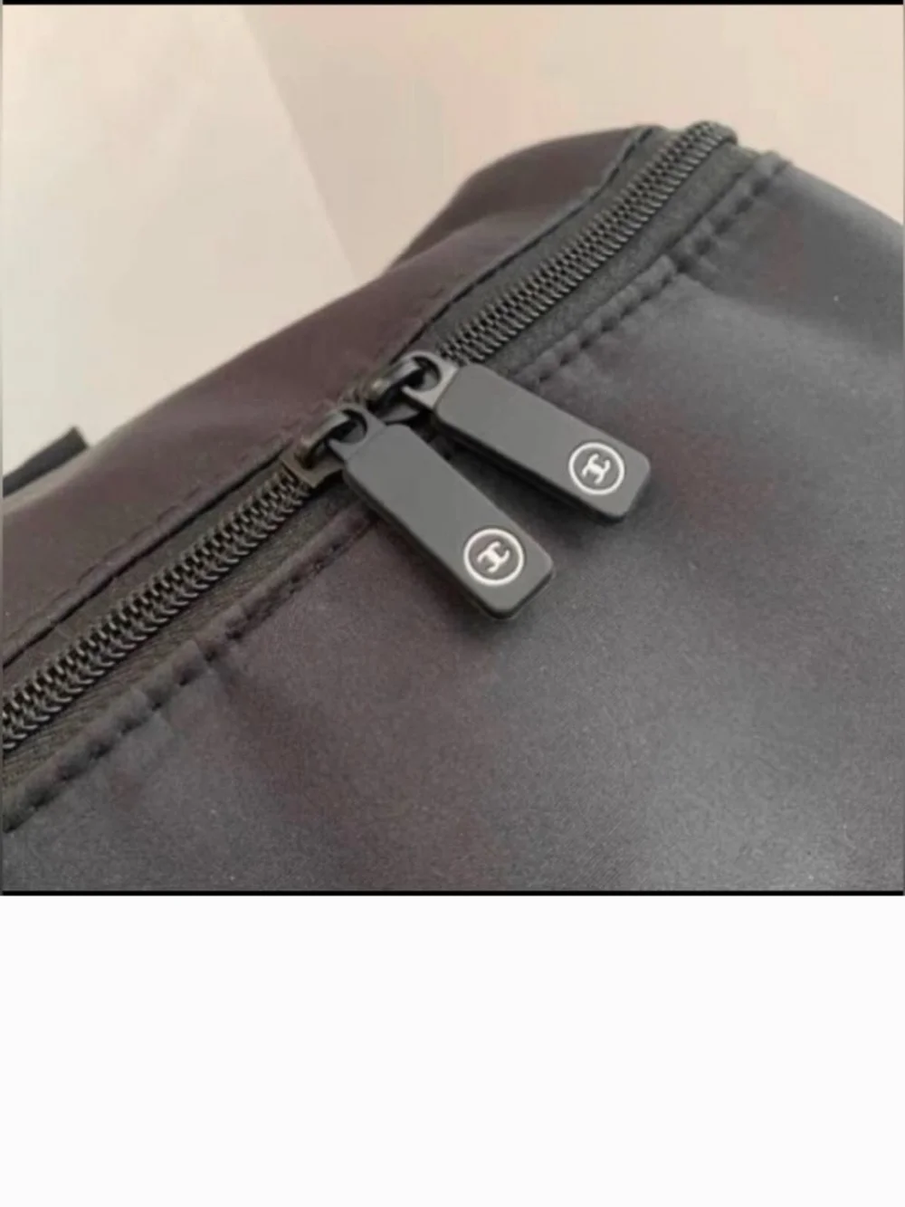 CHANEL Black Duffel Bag with White CC Logo